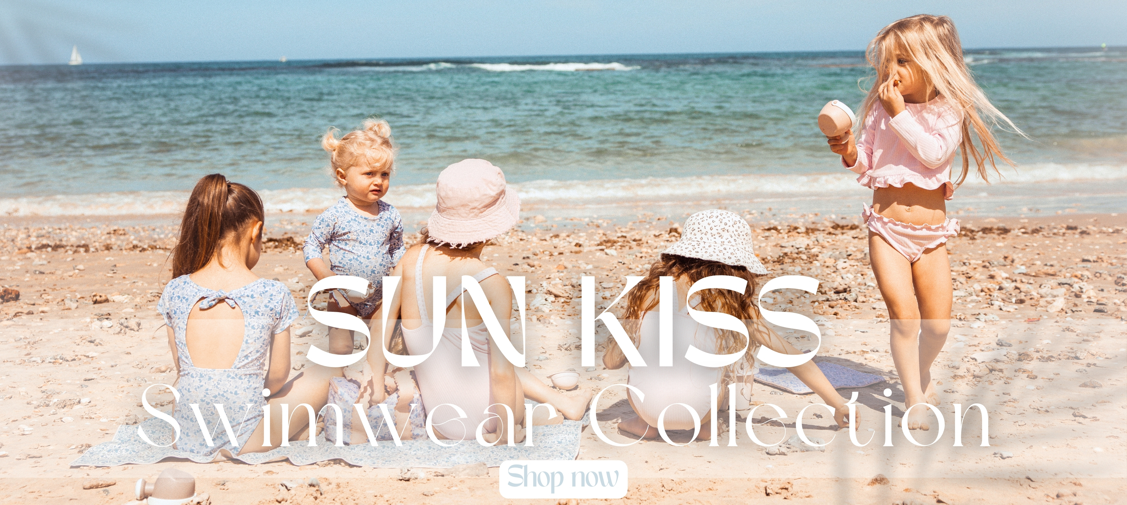 SUN KISS. SWIMWEAR COLLECTION. SHOP NOW.